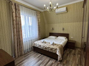 V Tsentre Goroda Apartments