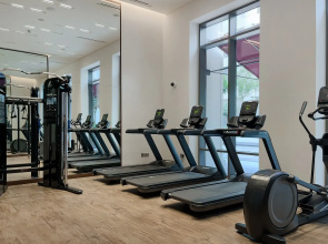 Апартаменты Сozy 1BR at Vida Residences Creek Beach
