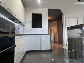 Апартаменты Стильная студия на побережье