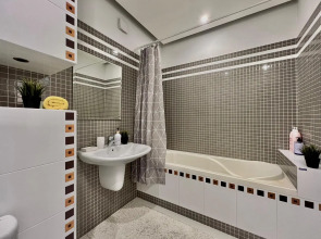 Апартаменты Уютная двухкомнатная квартира рядом с ЦУМом