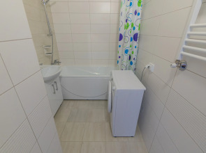 Апартаменты Двухкомнатная Квартира на Мансардном Этаже