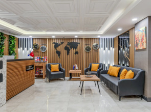 Отель Roys Hotel & Suites