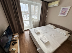 V Gosti! Na Stroitelei 90B (Studia na 2 etazhe) Apartments
