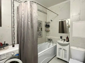 Квартира Уютная студия в 5 минутах от ТРЦ Планета