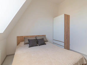 Апартаменты Двухкомнатная Квартира на Мансардном Этаже