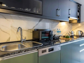 Отель BayMari Suites City Life