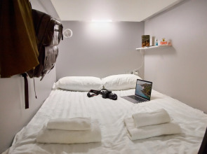 Капсульный отель Оранжевое Небо