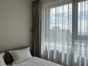 Апартаменты класса люкс с видом на город в центре