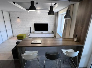 Апартаменты Стильная студия на побережье