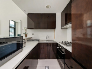 Апартаменты Stylish 1BR at Damac Merano Tower with Great View
