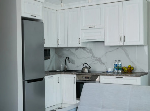 Апартаменты Luma White #2 в центре города с красивым видом на балконе