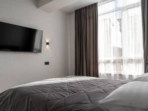 Просторная стильная квартира с видом на горы. Кватро 43