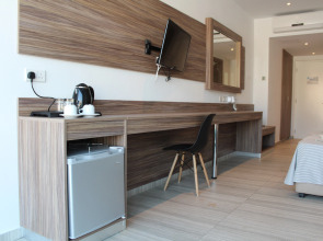 Отель Fedrania Gardens