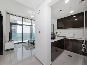 Апартаменты Stylish 1BR at Damac Merano Tower with Great View