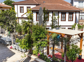 Отель WOO Town Suites