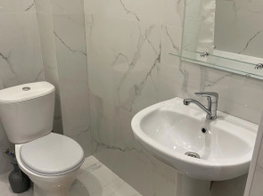 Апартаменты с Двумя Спальнями в Центре