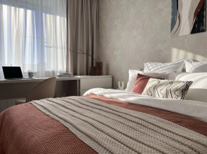 Апартаменты Macadamia Apartment