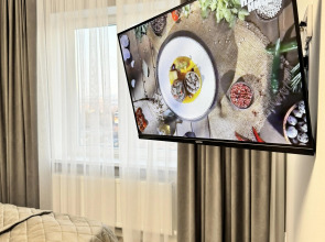 Квартира Двухкомнатный Лофт с Панорамным Видом на Город и Парк