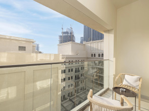 Апартаменты Сozy 1BR at Vida Residences Creek Beach