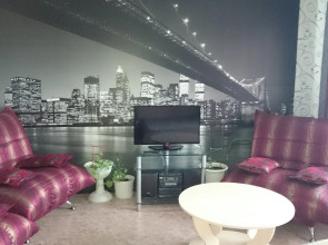 V Tsentre Goroda Apartments