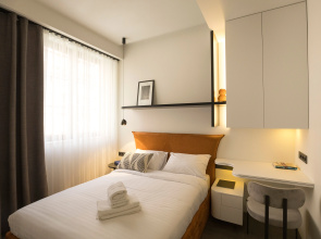 Cozy by Downtown Inn Apartments