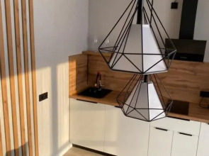 S kofemashinoi V tsentre goroda Flat