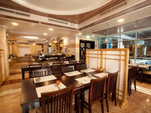 Отель Golden Tulip Media