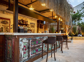 Отель WOO Town Suites