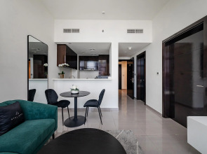 Апартаменты Stylish 1BR at Damac Merano Tower with Great View