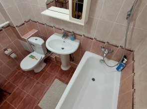 Апартаменты Квартира с качелями в центре