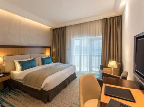 Отель Golden Tulip Media