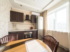 Квартира Тёплая солнечная возле БЦ Первая Башня