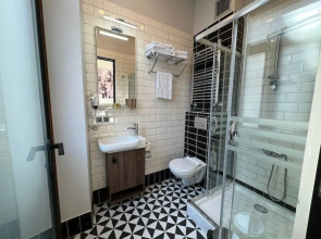 Отель Rafinn Hotel