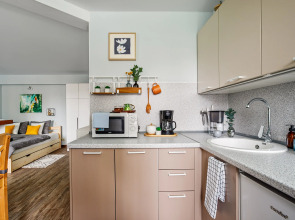 Апартаменты Butyrsky Cozy with Terrace, Parking and King-size Bed