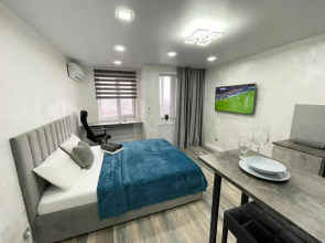 V Tsentre Goroda Apartments