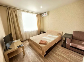 Uyutnaya Kvartira ryadom s Olimpiyskoy Alleey Flat