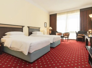 Отель Millennium Airport Hotel Dubai