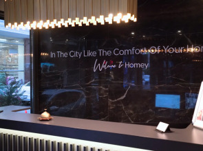 Отель Homey Airport