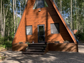 Частный дом A-фрейм в лесу Зеленого города