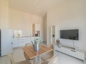 Апартаменты Двухкомнатная Квартира на Мансардном Этаже