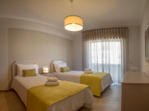 Апартаменты Flor da Rocha Turísticos