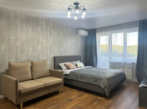 Апартаменты Уютная студия в экологичном районе города