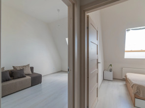 Апартаменты Двухкомнатная Квартира на Мансардном Этаже