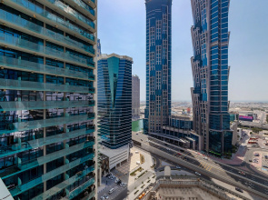 Апартаменты Stylish 1BR at Damac Merano Tower with Great View
