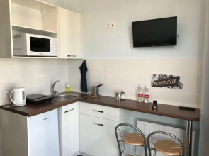 Апартаменты Маленькая студия с большим панорамным окном