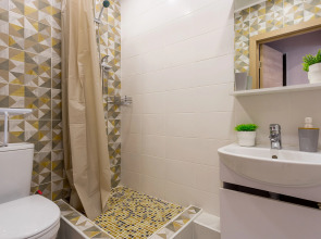 Апартаменты Уютная у стадиона на 1 этаже