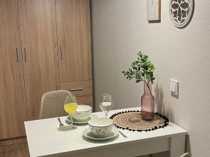 Апартаменты Уютная студия с собственной кухней