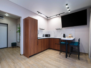 Квартира Новая студия в 5 минутах от ТРЦ Аура