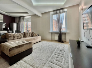 Апартаменты Уютная двухкомнатная квартира рядом с ЦУМом