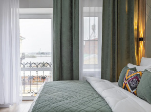 Апартаменты Уютная Студия на Улице Рождественской